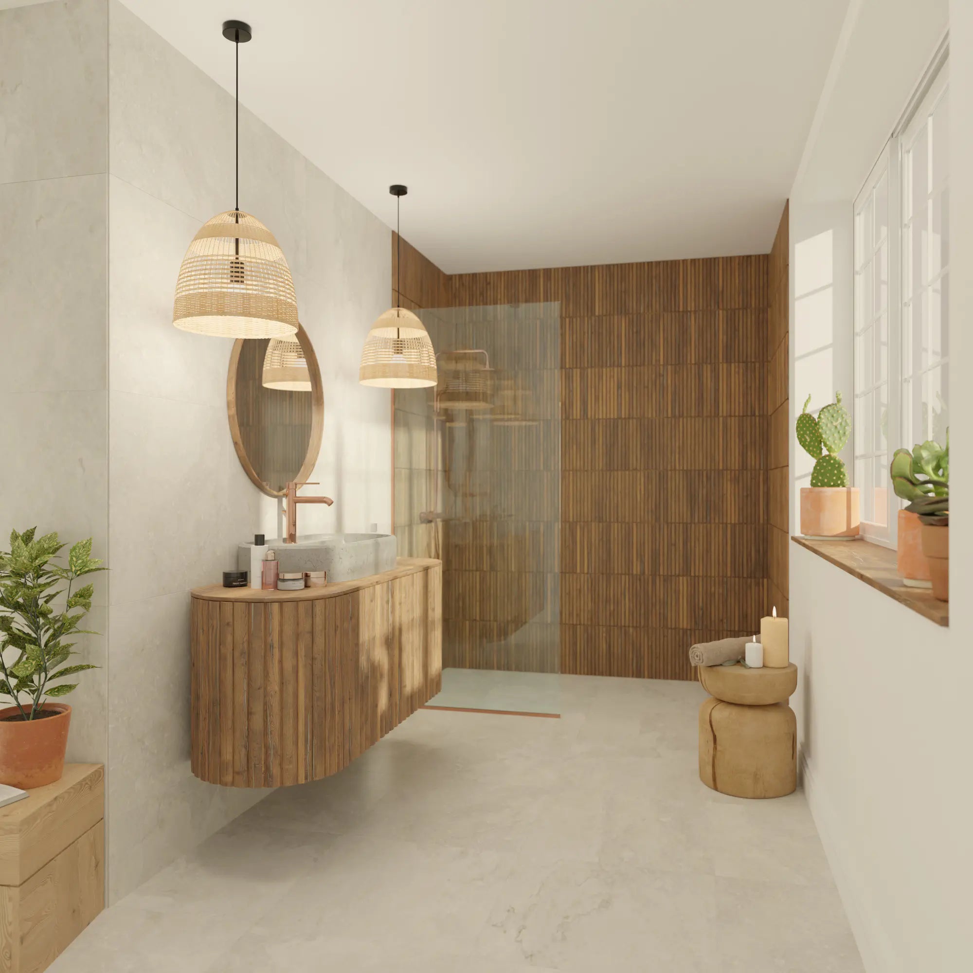 Salle de bain nature avec vasque à poser ovale en pierre naturelle Gris des Alpes, meuble en bois arrondi, douche à l'italienne, suspensions en rotin, robinetterie cuivre, ambiance bohème et minérale
