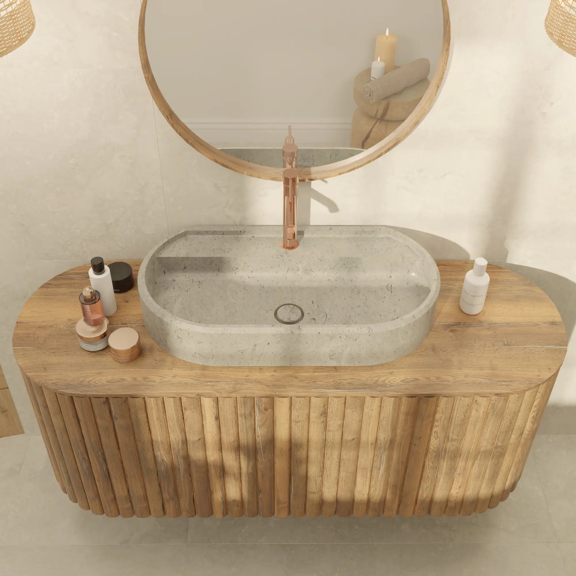 Vasque à poser ovale en pierre naturelle 80 cm Gris des Alpes, bonde Magique en pierre, robinetterie cuivrée, meuble suspendu en bois galbé à tasseaux, miroir rond, salle de bain bohème chaleureuse